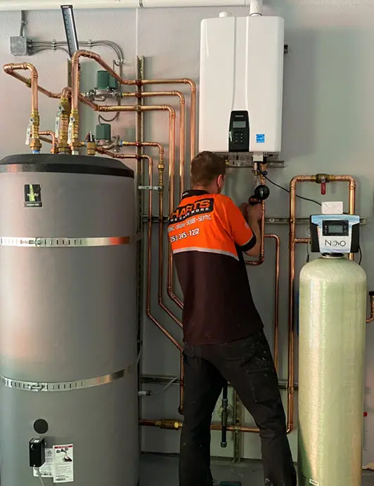 Harts Silverdale plumber servicing a a filtration system for residential plumbing.
