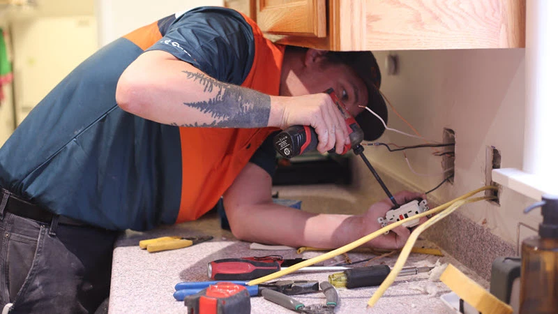 Licensed Harts electrician performing an electrical service in Renton, WA.