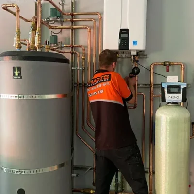 Harts Silverdale plumber servicing a a filtration system for residential plumbing.